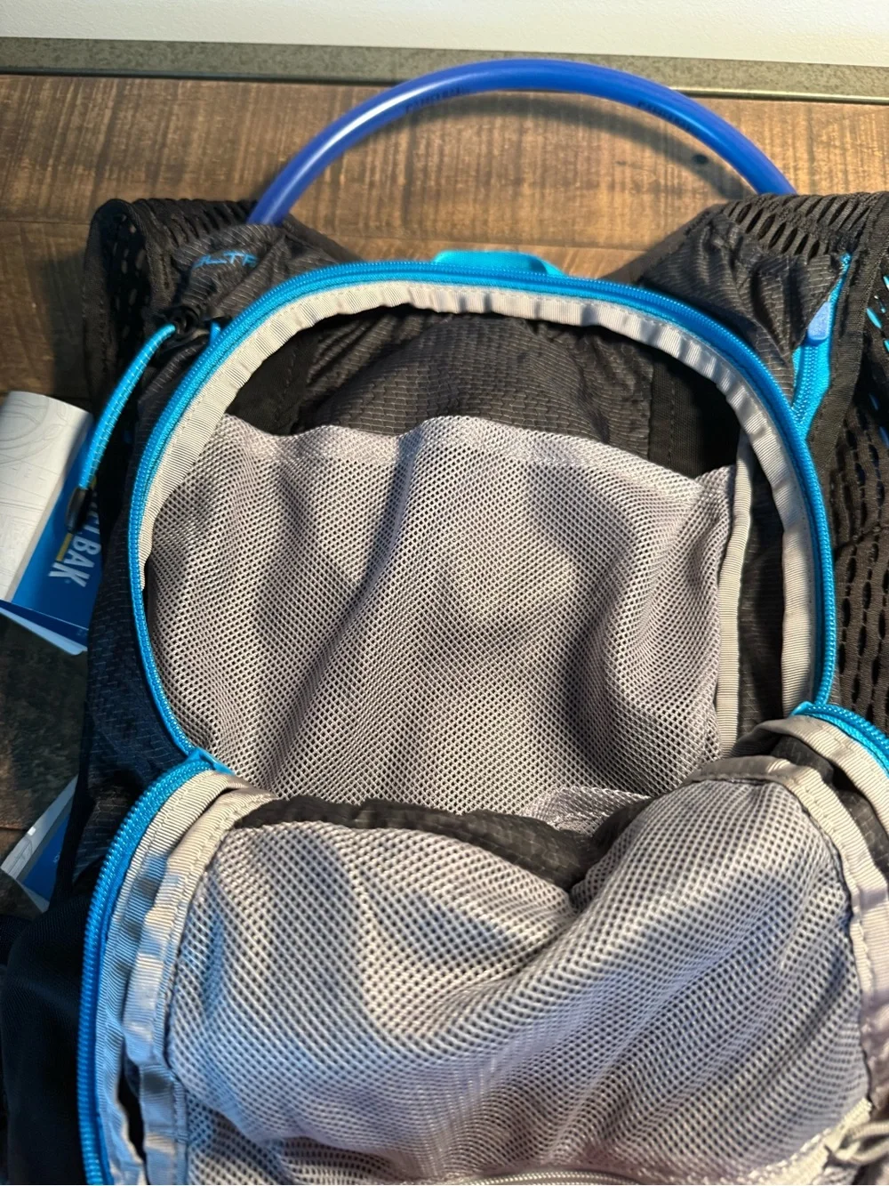 CamelBak Black Backpack with Blue Accents and Hydration Tube